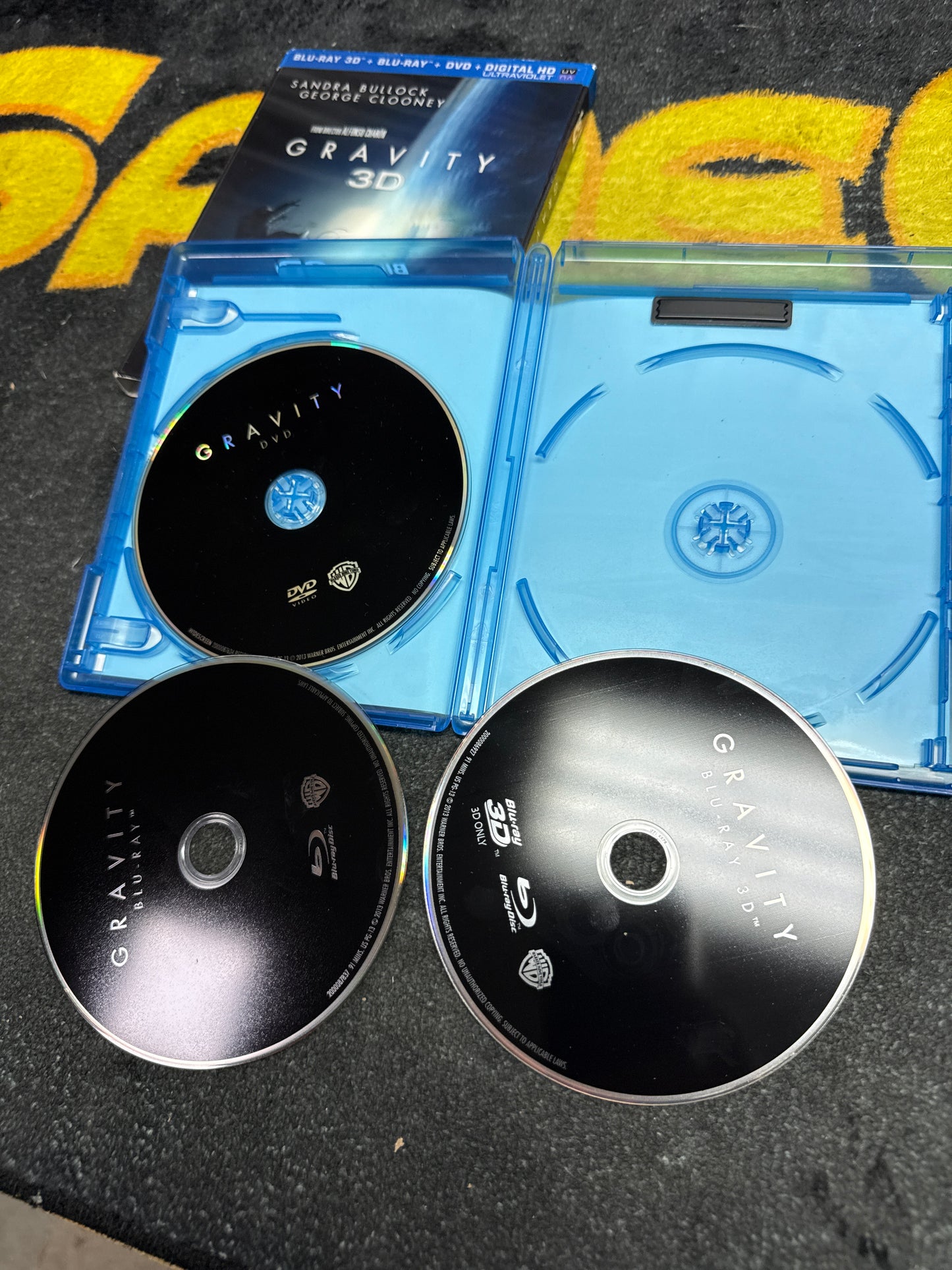 Gravity 3D Blu Ray + Blu Ray + DVD with Lenticular Slip (Used)
